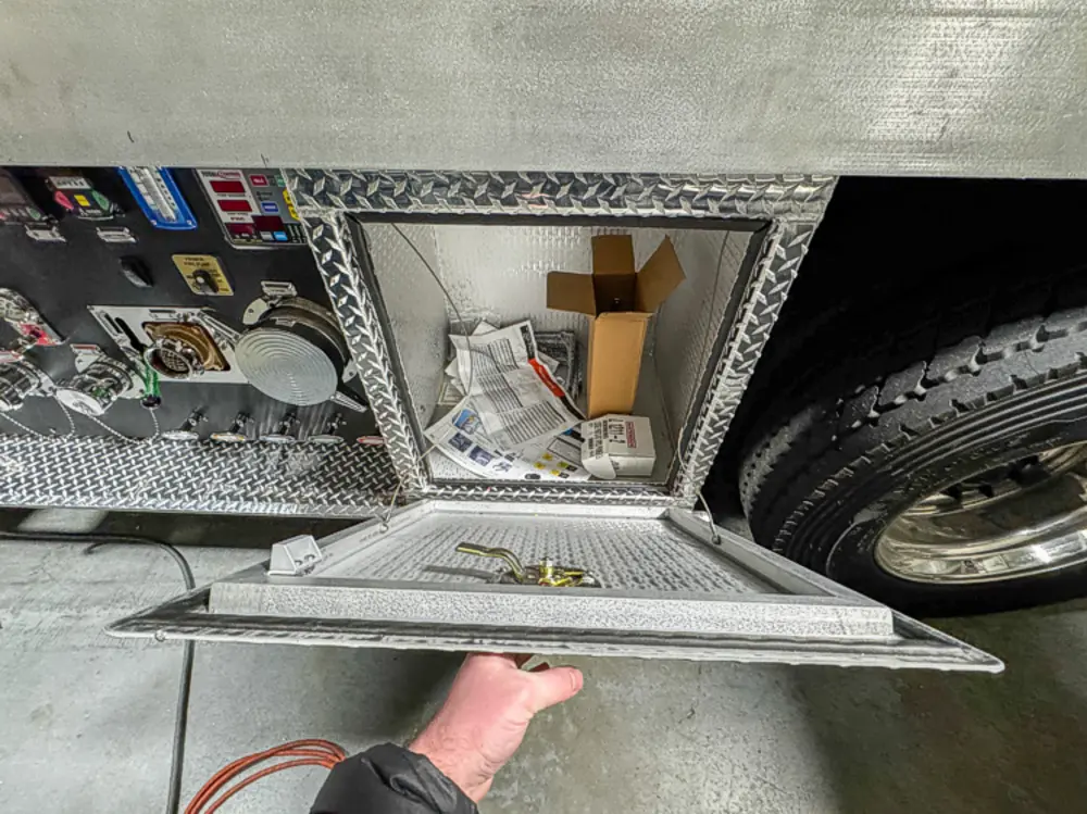 Apparatus in production bay with hood open, photo 11 of 303.